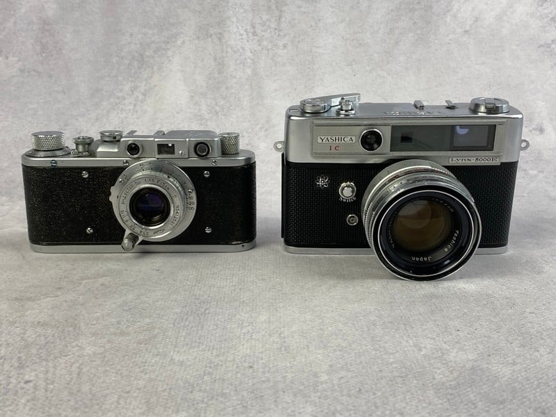2 x Cameras To Include Yashica C1 Lynx 5000E Camer