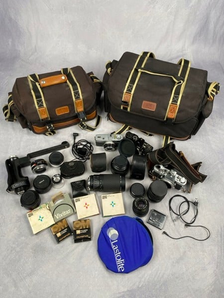 Assortment Of Camera Accessories To Include Olympu