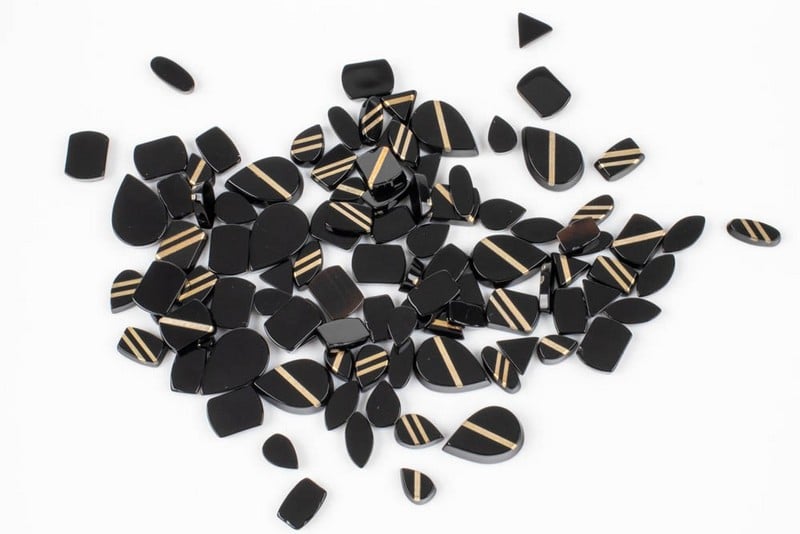 84.79ct Black Onyx with 9K Stripe Flat Mixed-cut P