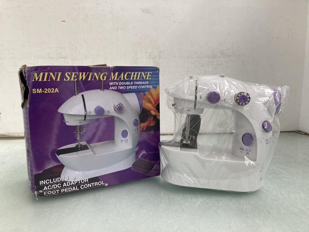 MINI SEWING MACHINE IN WHITE: LOCATION - A47