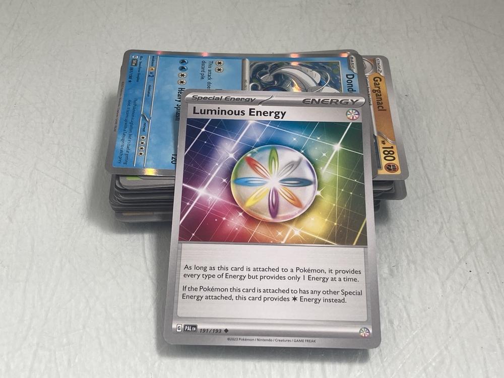 OVER 50 COLLECTIBLE POKÉMON TRADING CARDS INCLUDIN