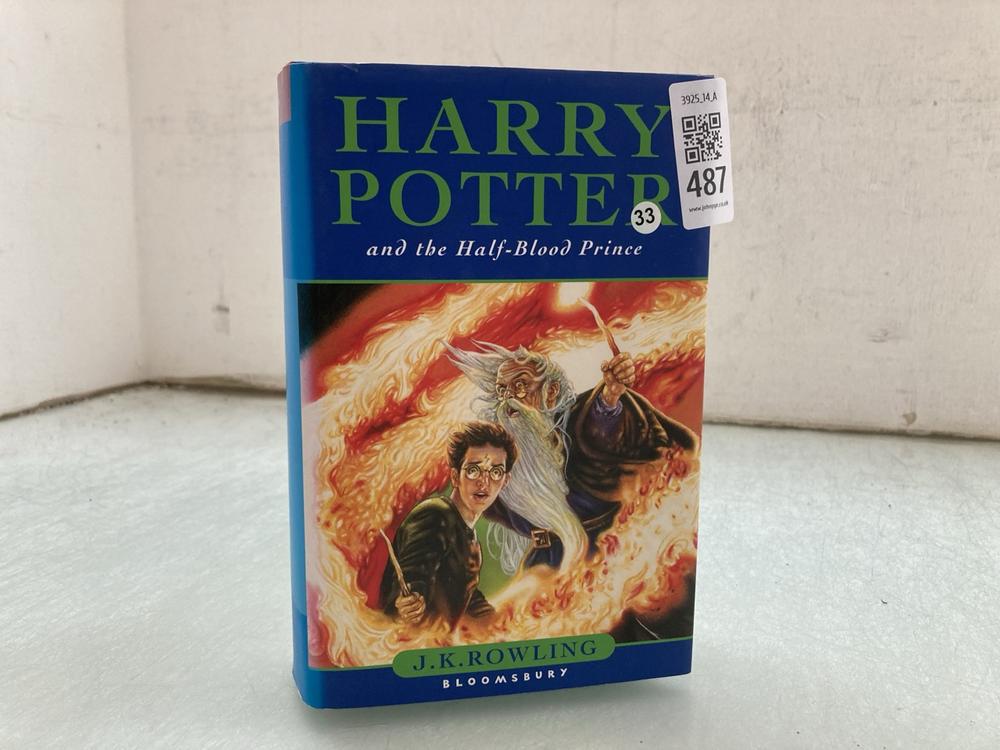 FIRST EDITION BOOK BY J.K. ROWLING, HARDBACK WITH 