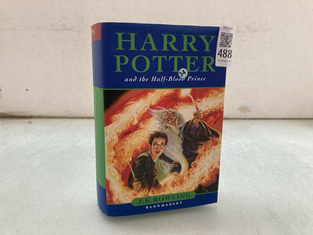 FIRST EDITION BOOK BY J.K. ROWLING, HARDBACK WITH 