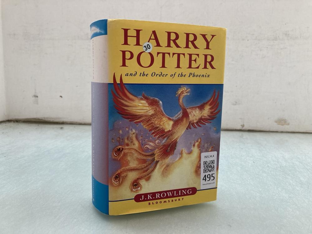 FIRST EDITION BOOK BY J.K. ROWLING, HARDBACK WITH 