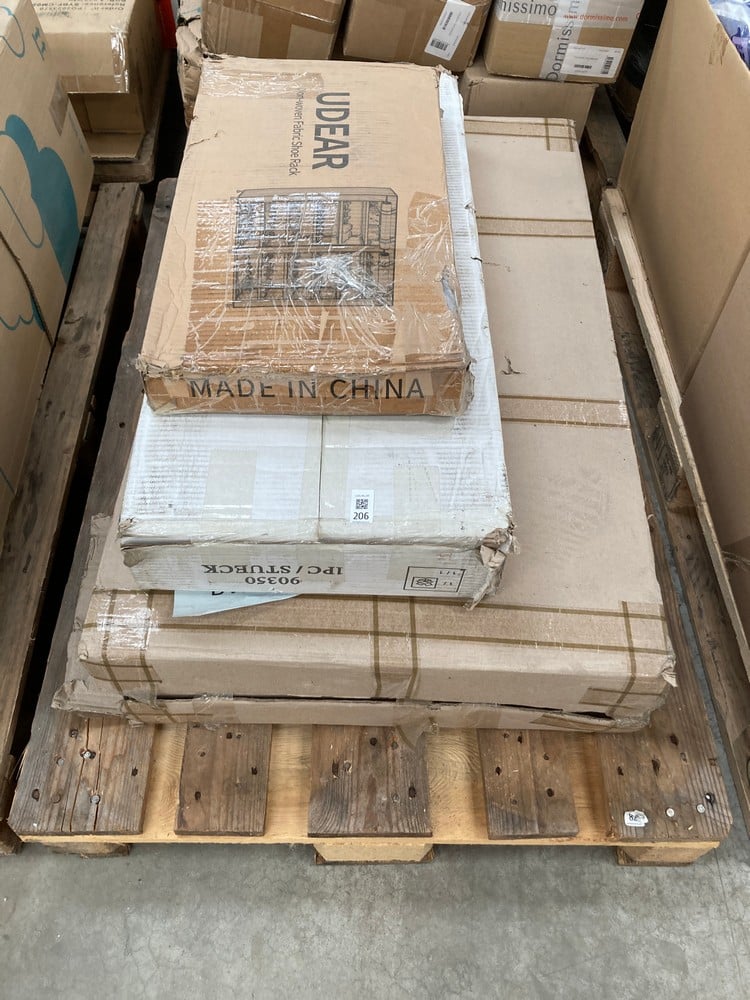 A PALLET OF FURNITURE FROM VARIOUS BRANDS AND STYL