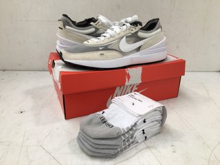 PAIR OF NIKE WAFFLE ONE SHOES IN WHITE AND BLACK IN UK SIZE 8.5: LOCATION - E13