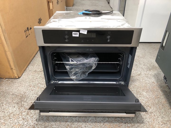 John Pye Auctions ZANUSSI BUILT IN COMPACT COMBI MICROWAVE OVEN