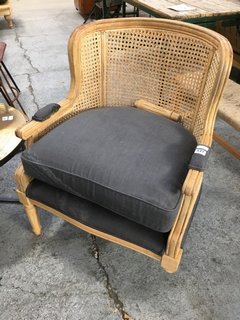 NKUKU KAZIRIA CANE & LINEN ARMCHAIR IN NAVY - RRP £995: LOCATION - C8