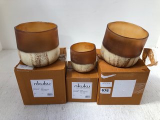 2X NKUKU.COM LARGE NGOLO TEALIGHT HOLDER IN AMBER & 1X SMALL NGOLO TEALIGHT HOLDER IN AMBER: LOCATION - CR