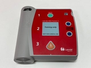 LAERDAL AED TRAINER 2 MEDICAL TRAINING EQUIPMENT (ORIGINAL RRP - £557.75) IN RED & GREY. (WITH BATTERY, CASE, PADS AND MANUAL) [JPTM103665]. THIS PRODUCT IS FULLY FUNCTIONAL AND IS PART OF OUR PREMIU