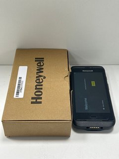 HONEYWELL CT40 HANDHELD PHONE SCANNER IN BLACK. (COMES WITH ITS BOX) [JPTM103518]. THIS PRODUCT IS FULLY FUNCTIONAL AND IS PART OF OUR PREMIUM TECH AND ELECTRONICS RANGE