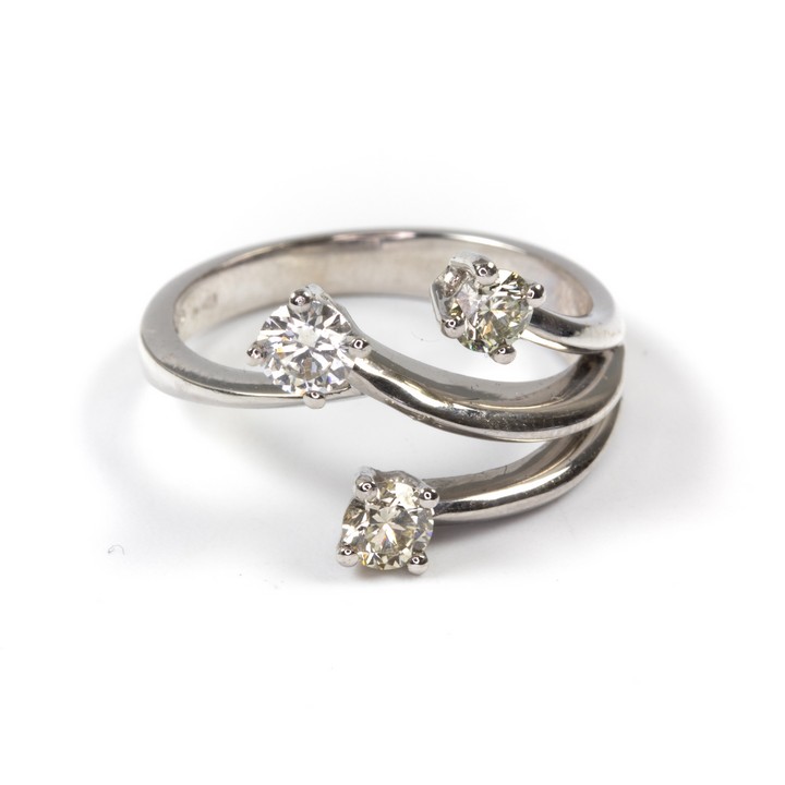 18K White 0.63ct Diamond Three Stone Split Ring, Size N½, 5.1g.  Auction Guide: £900-£1,000