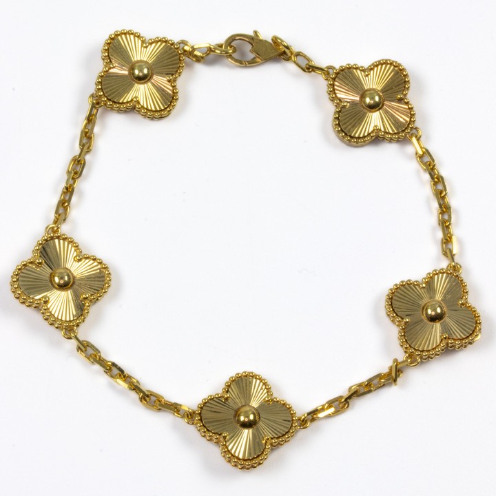 9K Yellow Five Flower with 18K Chain Bracelet, 20cm, 14.8g.  Auction Guide: £800-£1000