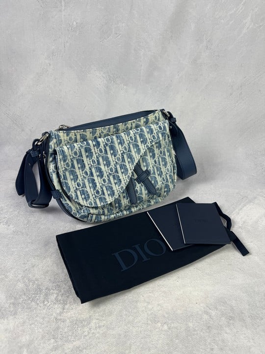 Christian Dior Oblique Denim Saddle Bag, Comes with Dust Bag.  Dimensions:Approx H:17cm W:27cm D:6cm.