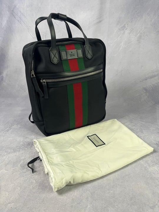 Gucci Techno Black Canvas Stripe BackPack, Comes with Dust Bag.  Dimensions:Approx H:37cm W:32cm D:13cm.