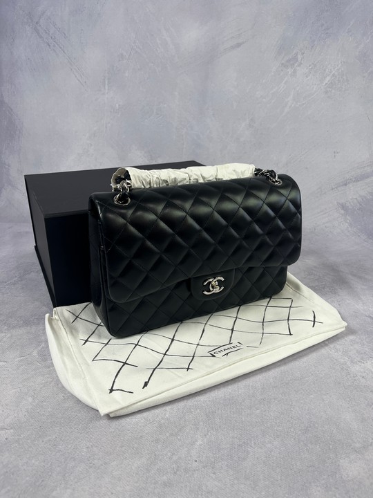 Chanel Quilted Black, Double Flap Lambskin Handbag, Comes with Dust Bag Channel Box and paperwork. Circa 2018/19.  Dimensions:Approx H:20cm W:31cm D:9cm.
