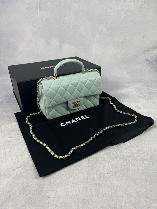 Chanel Quilted Baby Blue, Mini lambskin Flap HandBag, Comes with Dust Bag Channel Box and paperwork.  Dimensions:Approx H: 13cm W: 20cm D:7cm.