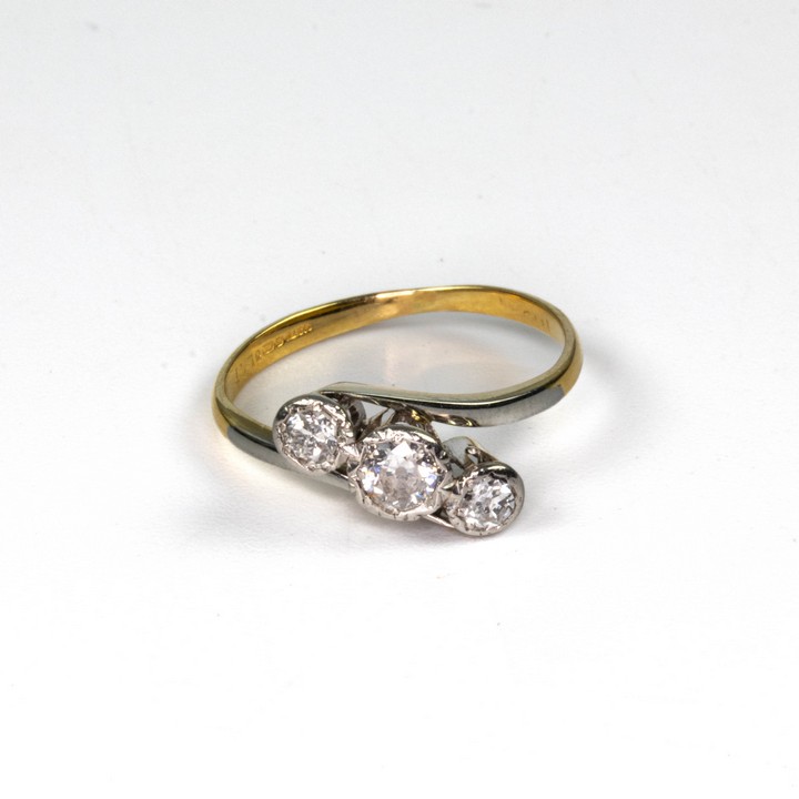 18ct Yellow and White Gold 0.40ct Diamond Three Stone Twist Ring, Size K, 2.2g.  Auction Guide: £250-£350