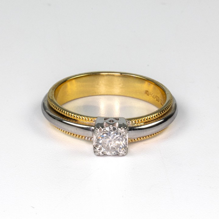 18ct White and Yellow Gold 0.45ct Diamond Solitaire Ring, Size O, 5.7g. Colour J, Clarity I1-I2.  Auction Guide: £475-£575