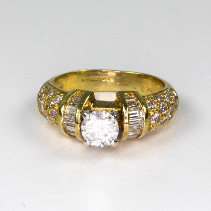 18K Yellow 1.60ct Diamond Single Stone With Baguette and Pavé Shoulders Ring, Size L, 6.9g. Colour H , Clarity I1 .  Auction Guide: £800-£900