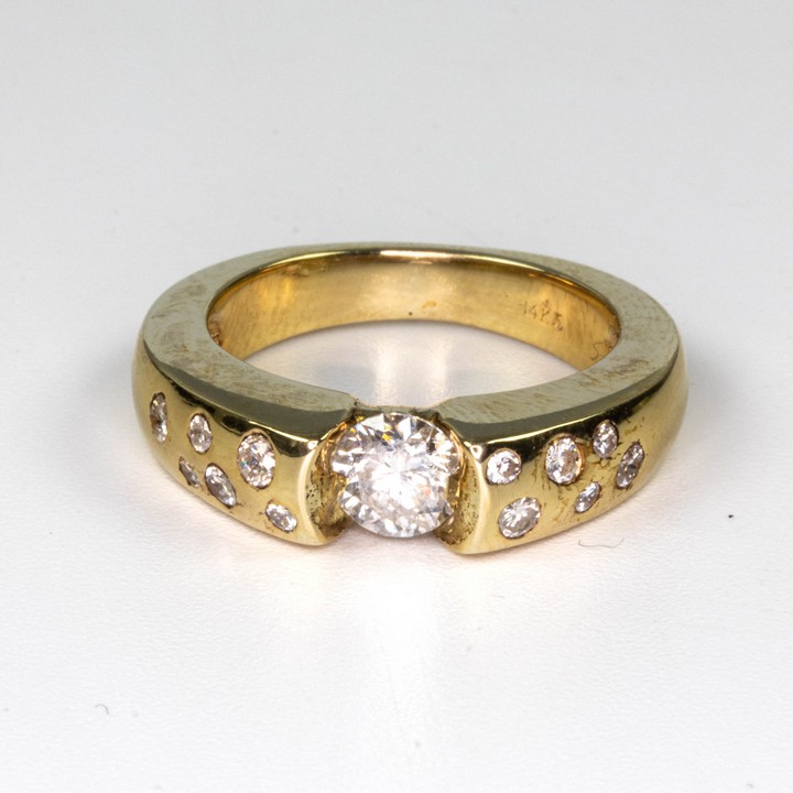 14K Yellow 0.70ct Single Stone and Shoulders Band Ring, Size K, 6.8g. Colour H, Clarity Si2.  Auction Guide: £700-£800