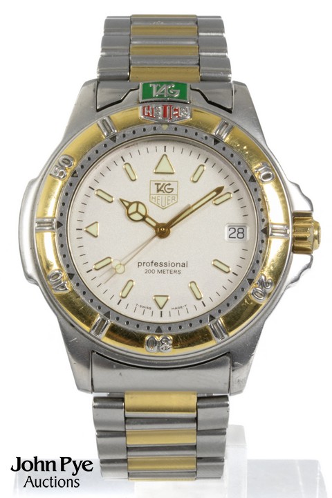 Tag Heuer 4000 Ref: WF1120-0 Quartz Watch. 38mm Stainless-Steel Case with Gold- Plated Stainless-Steel Uni-Directional Bezel, Silver Dial and Stainless Steel & Gold-Plated Bracelet. Age: Unknown. No