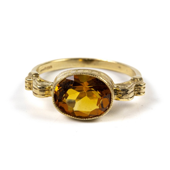 9ct Yellow Gold Citrine Faceted Oval-cut Scroll Shoulders Ring, Size N½, 2.9g.  Auction Guide: £100-£150
