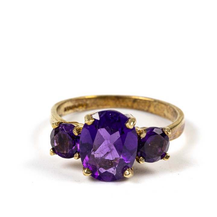 9ct Yellow Gold Amethyst Three Stone Ring, Size N½, 3.4g.  Auction Guide: £150-£250