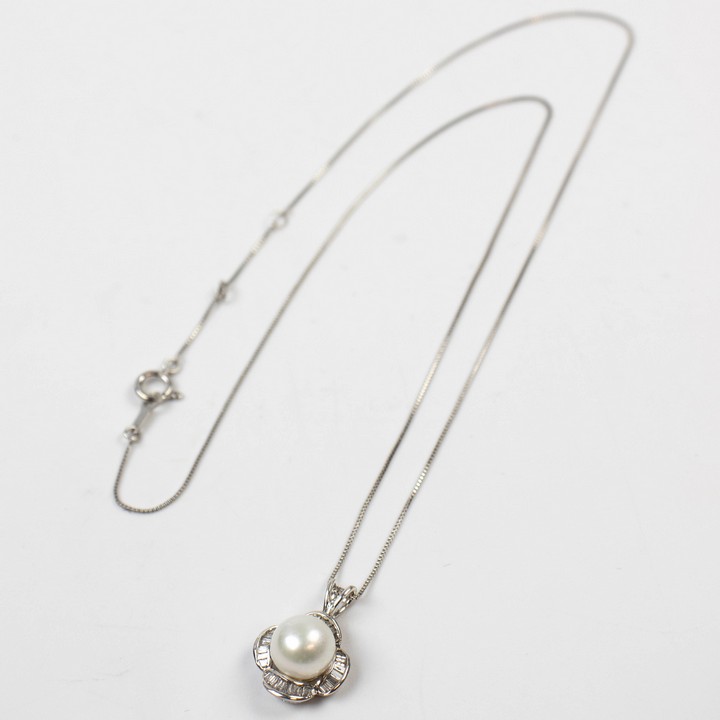 18K White 0.60ct Diamond and South Sea Pearl Pendant, 2.8cm and Chain, 40cm, 2.7g.  Auction Guide: £350-£450