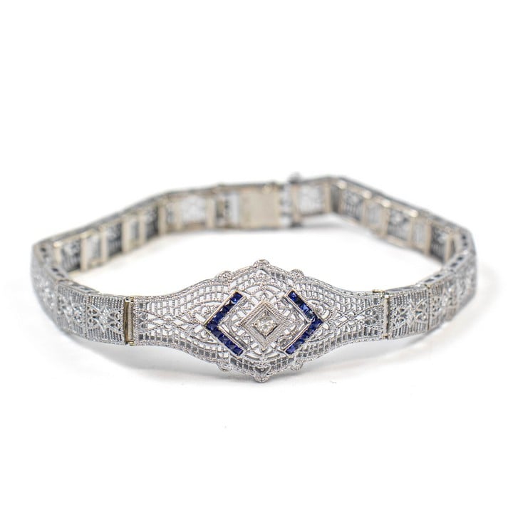 14K and Platinum 0.18ct Sapphire and Diamond Art Deco Bracelet, 18cm, 11.8g.  Auction Guide: £750-£850