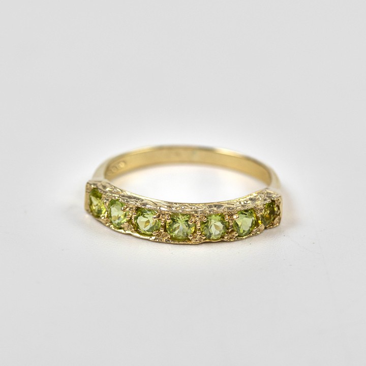9ct Yellow Gold Peridot Seven Stone Band Ring, Size L, 1.8g.  Auction Guide: £125-£225