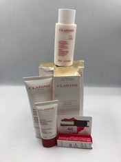 QTY OF CLARINS PRODUCTS TO INCLUDE DELUXE EDITION DOUBLE SERUM,COMPLETE AGE CONTROL CONCENTRATE 75ML RRP £110:: LOCATION - A