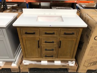OVE DECORS FLOOR STANDING 2 DOOR 5 DRAWER SINK UNIT IN ALMOND LATTE WITH WHITE GRANITE COUNTER TOP WITH BACKSPLASH PRE-DRILLED FOR 3TH BASIN MIXERS, TOP COMES COMPLETE WITH CERAMIC UNDERMOUNT BASIN 1