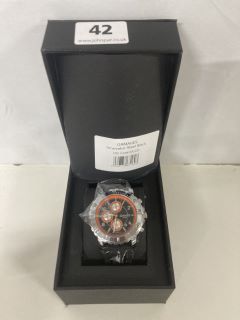 GAMAGES INNOVATOR STEEL BLACK WATCH - GA1221 Model Specifications: Automatic Movement 163 Part 20 Jewel Hand Assembled Movement,Black Dial with Orange Chapter Ring & Subdials, Day, Date, Month & 24 H