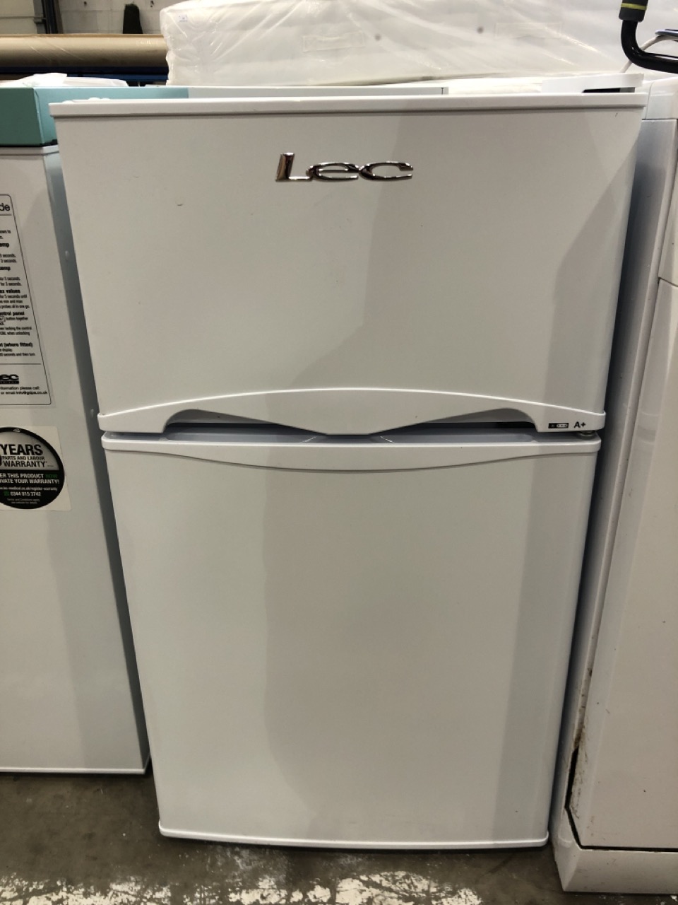 John Pye Auctions LEC FRIDGE FREEZER MODEL T50084W LOCATION FLOOR(COLLECTION OR OPTIONAL