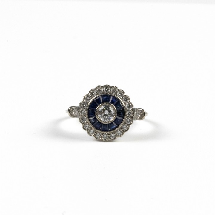 18ct White Gold 0.75ct Diamond and Blue Stone Ring, Size O½, 3.6g.  Auction Guide: £750-£950 (VAT Only Payable on Buyers Premium)