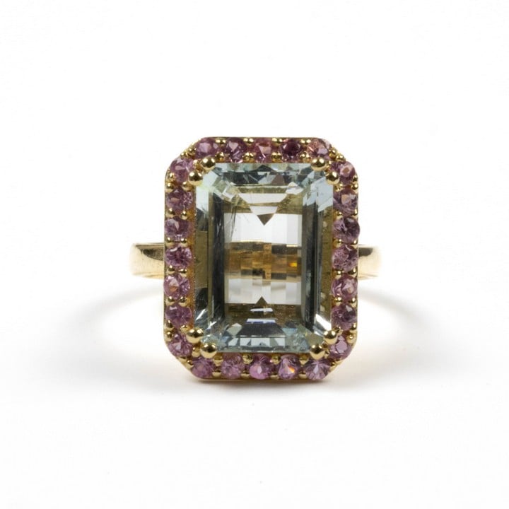 18K Yellow 5.00ct Natural Aquamarine and 1.00ct Pink Sapphire Halo Ring, Size N½, 6.8g.  Auction Guide: £1,100-£1,600 (VAT Only Payable on Buyers Premium)