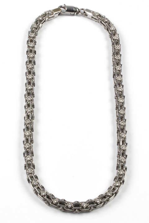 9K White Clear Stone Fancy Link Chain, 60cm, 177.8g.  Auction Guide: £2,600-£3,100 (VAT Only Payable on Buyers Premium)