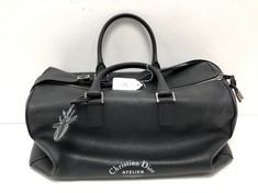 DIOR, BOSTON ATELIER BLACK CALFSKIN LEATHER TRAVEL BAG WITH BLACK LEATHER HANDLES AND REMOVABLE ADJUSTABLE STRAP. ITEM TO INCLUDE ""STRAP, WASP CHARM" WITH AN ESTIMATED SIZE OF 45*23*21CM (ITEM INCLU