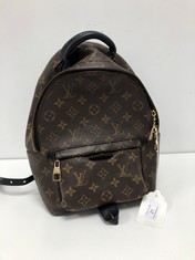 LOUIS VUITTON, PALM SPRING BROWN MONOGRAM CANVAS BACKPACK WITH BLACK LEATHER ADJUSTABLE STRAP. ITEM TO INCLUDE DUSTBAG WITH AN ESTIMATED SIZE OF 20*24*9CM (ITEM INCLUDES A CERTIFICATE OF AUTHENTICITY