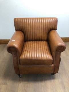 NKUKU NARWANA RIBBED LEATHER ARMCHAIR IN AGED TAN RRP - £1500: LOCATION - A3