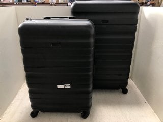 JOHN LEWIS & PARTNERS LARGE HARD SHELL SWIVEL SUITCASE IN BLACK TO INCLUDE MATCHING MEDIUM HARD SHELL SWIVEL SUITCASE IN BLACK: LOCATION - BR7