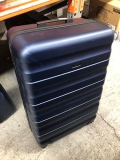 JOHN LEWIS & PARTNERS LARGE HARD SHELL SWIVEL SUITCASE IN NAVY: LOCATION - AR14