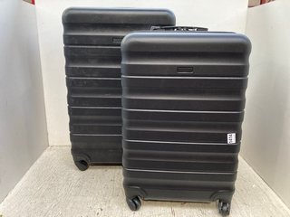JOHN LEWIS & PARTNERS 2 X MEDIUM/LARGE SIZE HARD SHELL WHEELED COMBINATION LOCK SUITCASES IN BLACK: LOCATION - D11