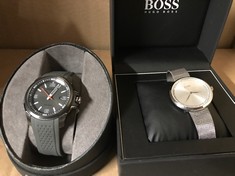 MENS CITIZEN ECO DRIVE WATCH - STAINLESS STEEL FACE - GREY RUBBER STRAP + LADIES STAINLESS STEEL HUGO BOSS WATCH : LOCATION - BACK RACK