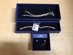 QTY OF ITEMS TO INCLUDE SWAROVSKI TENNIS DELUXE BRACELET, ROUND, WHITE, GOLD-TONE PLATED: LOCATION - C RACK