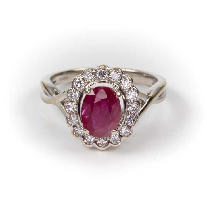 18ct White Gold 1.90ct Ruby and 0.56ct Diamond Halo Ring, Size N, 4.6g. Colour F-G, Clarity VS.  Auction Guide: £2,400-£2,900 (VAT Only Payable on Buyers Premium)