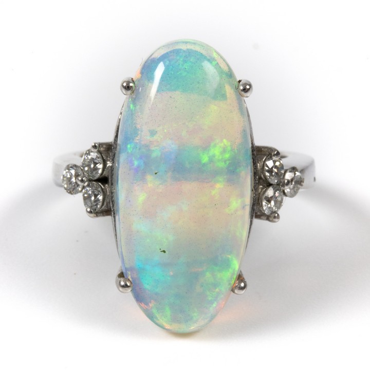 18K White 6.70ct Natural Opal and 0.30ct Diamond Ring, Size M½, 8.4g. Colour G, Clarity VS.  Auction Guide: £1,200-£1,700 (VAT Only Payable on Buyers Premium)