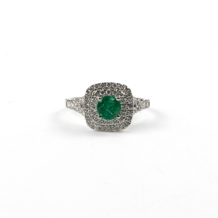 Platinum 950 0.57ct Emerald and 0.61ct Diamond Double Halo and Shoulders Ring, Size M, 5.4g.  Auction Guide: £900-£1,100