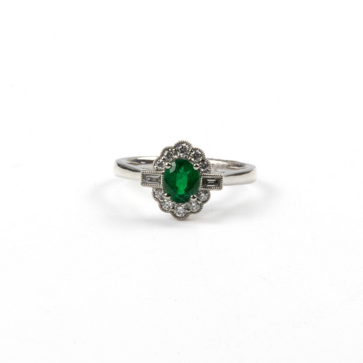 Platinum 950 0.58ct Emerald and 0.23ct Diamond Halo Ring, Size M, 5g.  Auction Guide: £900-£1,100